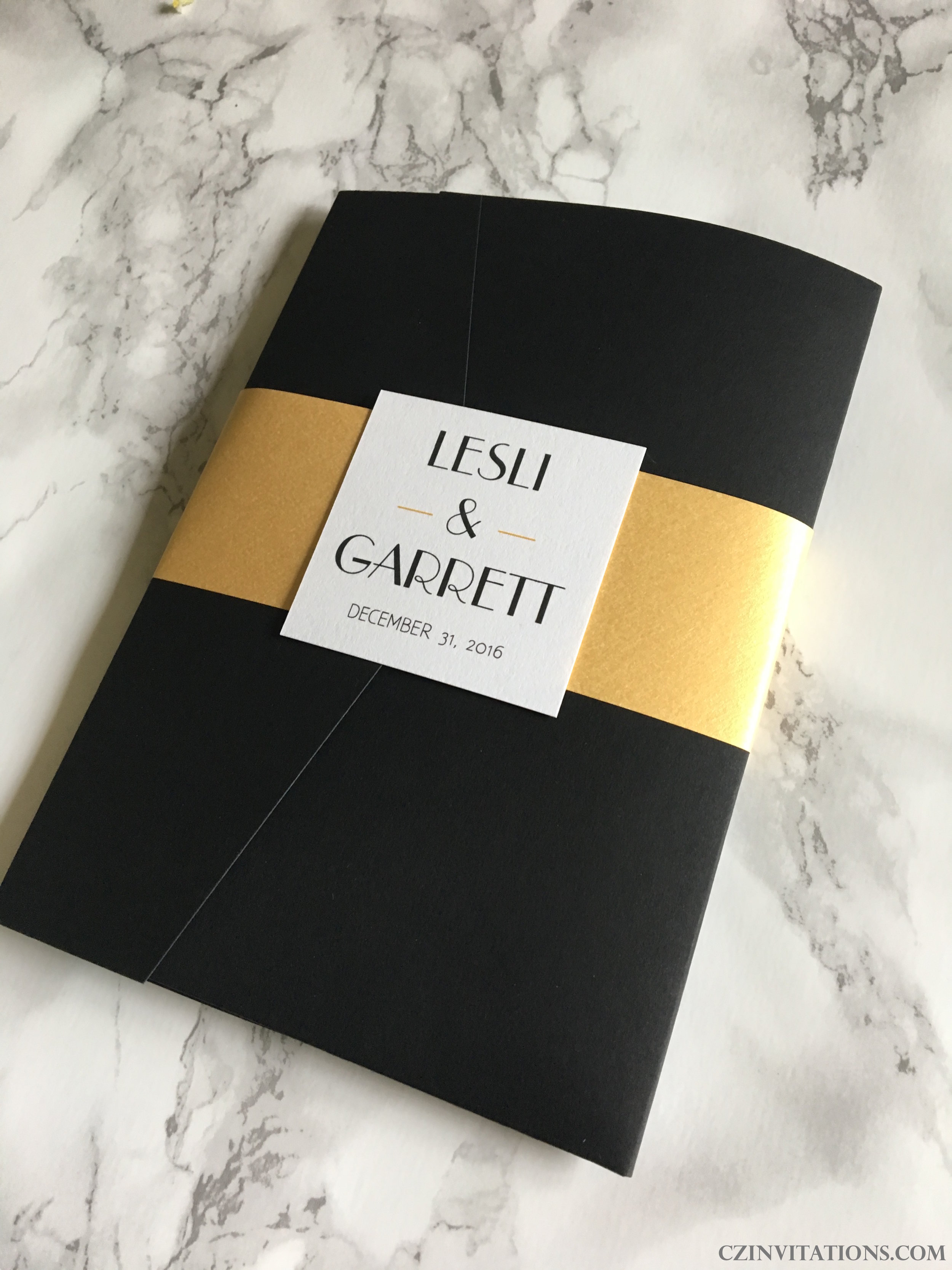 Black and gold pocket wedding invitation 