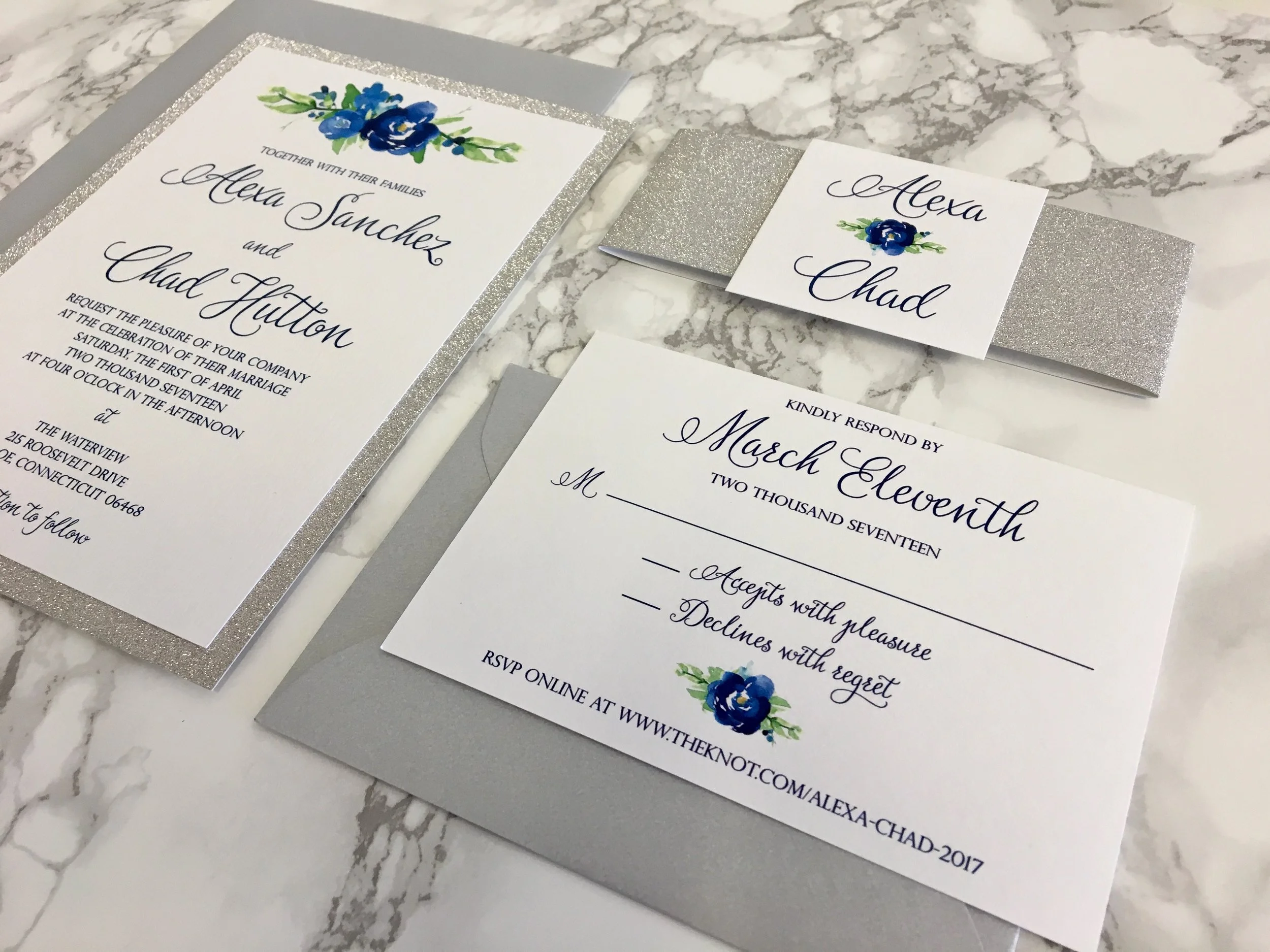 blue floral wedding invitation with silver glitter