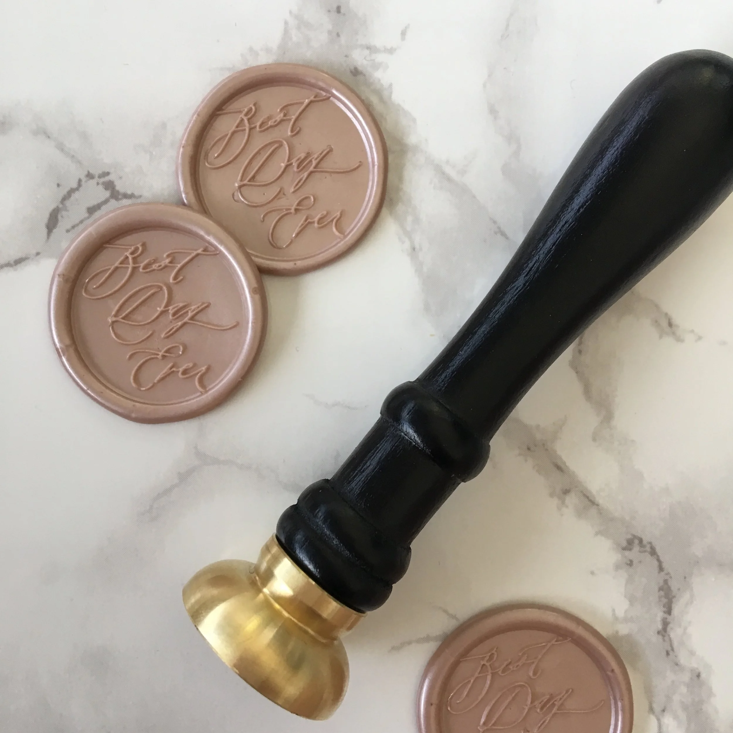 pink wedding invitation with wax seal