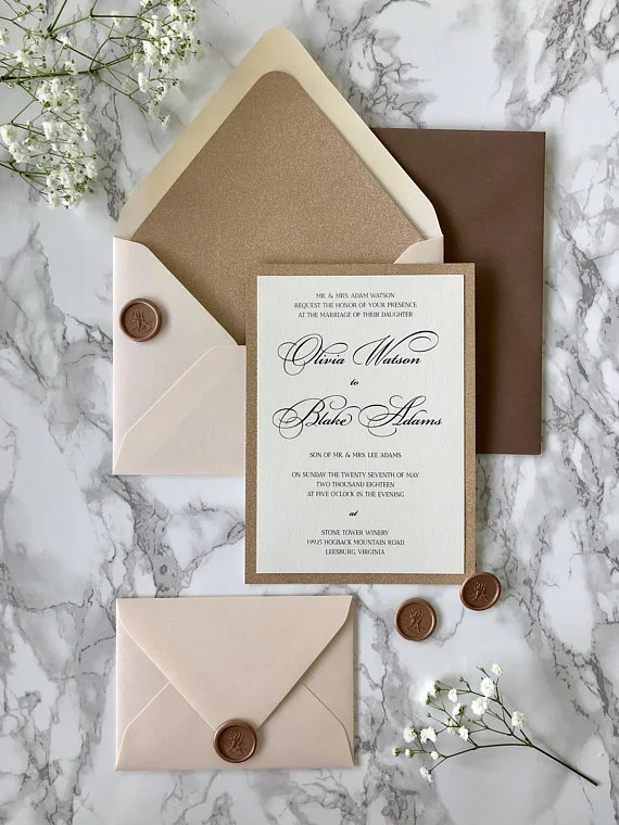 rose gold glitter wedding invitation with wax seal