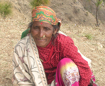 Woman on mountain path, Nepal