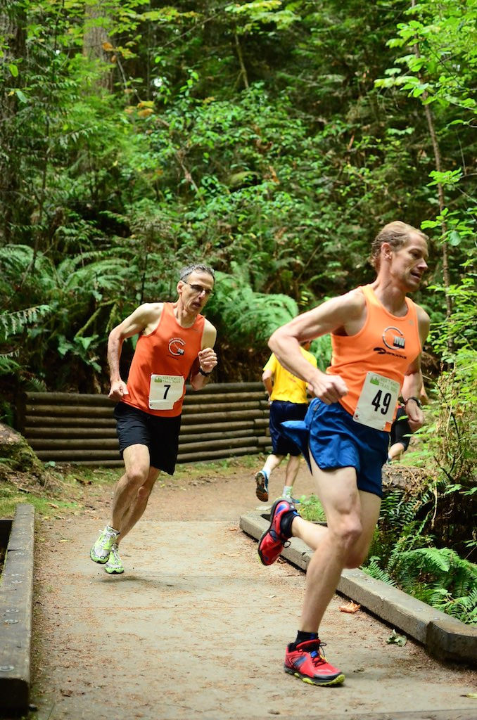  Club members Joe Bisignano and Carl Winter compete at the Redmond Watershed 5 mile trail race in 2015, placing second and first overall! 