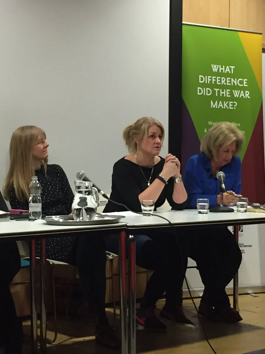 Me on a panel looking serious.