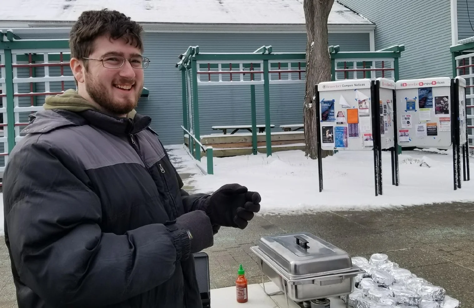Brother Joe Noel '18 works the front end of the BEC operation, selling sandwiches to hungry customers.