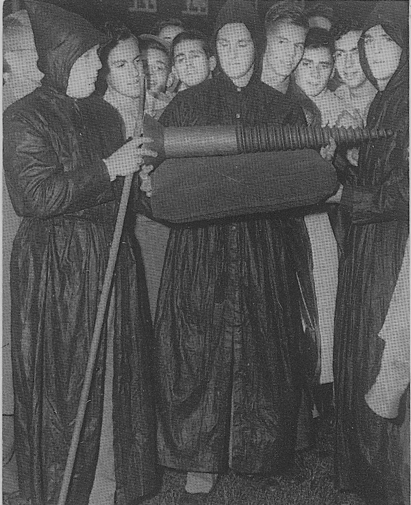  Brother Arnold Zimmer '50 (center) escorted by SigEp "Tibetan Monks" Bill Krucke '51 and Fred Lane '51 present The Screw in 1948.