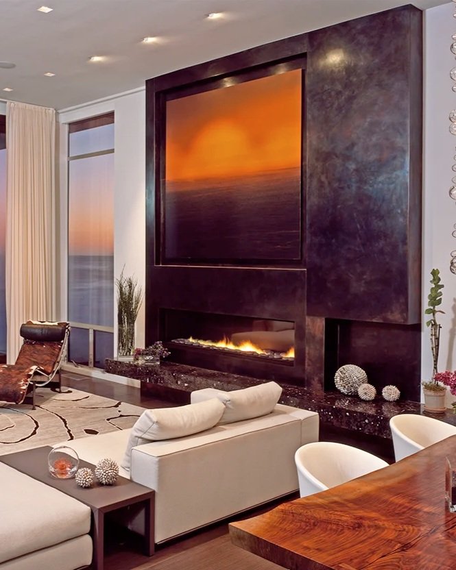  Patina’d bronze fireplace surrounds for RJC Builders 