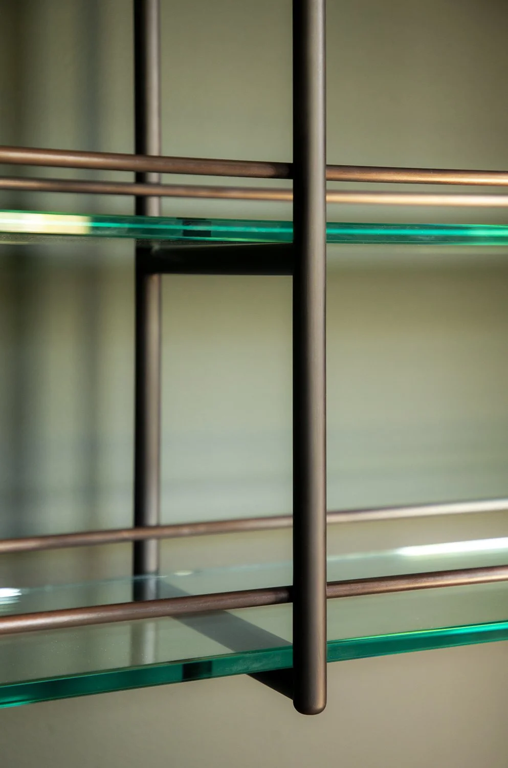  Patina’d brass bar shelf for interior design studio Studio Keeta 