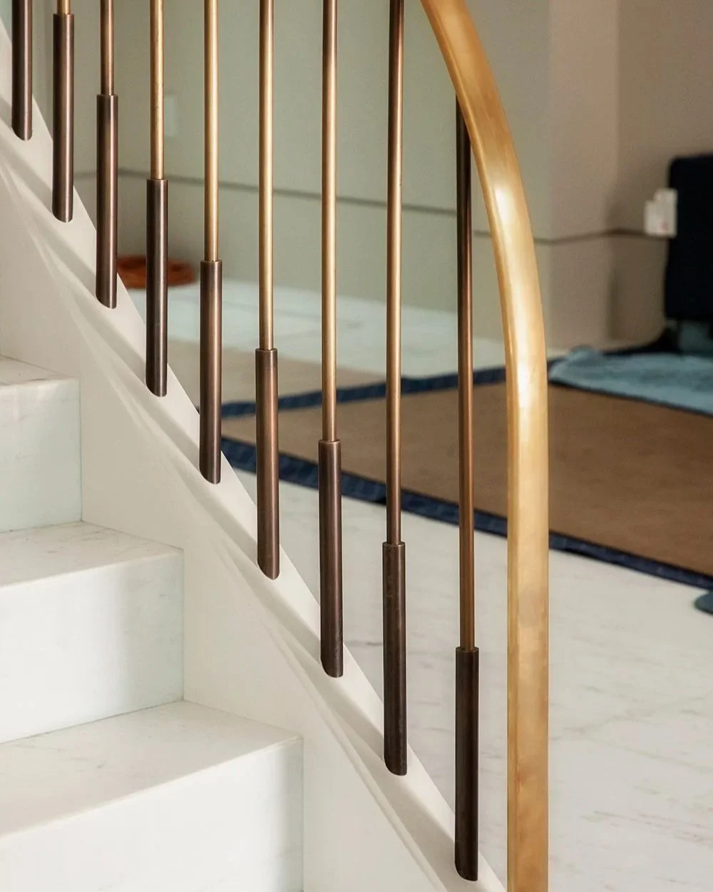  Patina’d brass spiral staircase for interior designer Judith Lance 