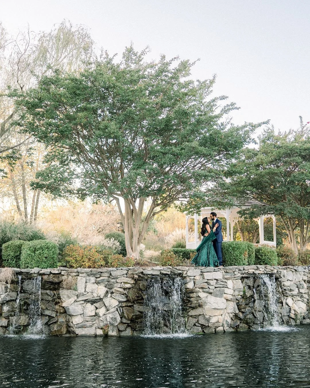These two had the most incredible wedding weekend! 

They shared a touching private first look on the veranda overlooking their magical ceremony site by the pond.

And for their portraits, we swept them away from the busyness to secluded spots on the