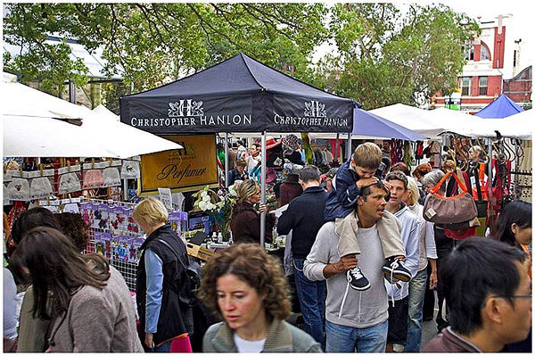 CHRISTOPHER HANLON® MARKET STORE LOCATED ON Oxford Street, Paddington AUSTRALIA. PICTURED: NINYAL BOLDIEREV THE MULTI-LINGUIST SELLING CH® TO LOCALS + INTERNATIONAL TOURISTS. 'This is probably Sydney's best known open air market. Very popular with tourists, it is only open on a Saturday and is full of high quality and often highly priced products. Christopher Hanlon is a former graphic artist turned perfumer. His classy products sell all over the world in retail outlets, yet every Saturday he sets up his market stall in Paddington.' SOURCE: http://sydneywebcam.blogspot.com.au/2005/05/