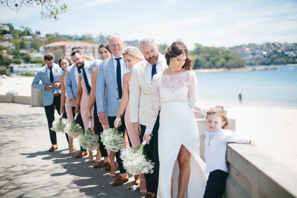 Lizzy, Mitch, Flynn and the whole gang on their wedding day