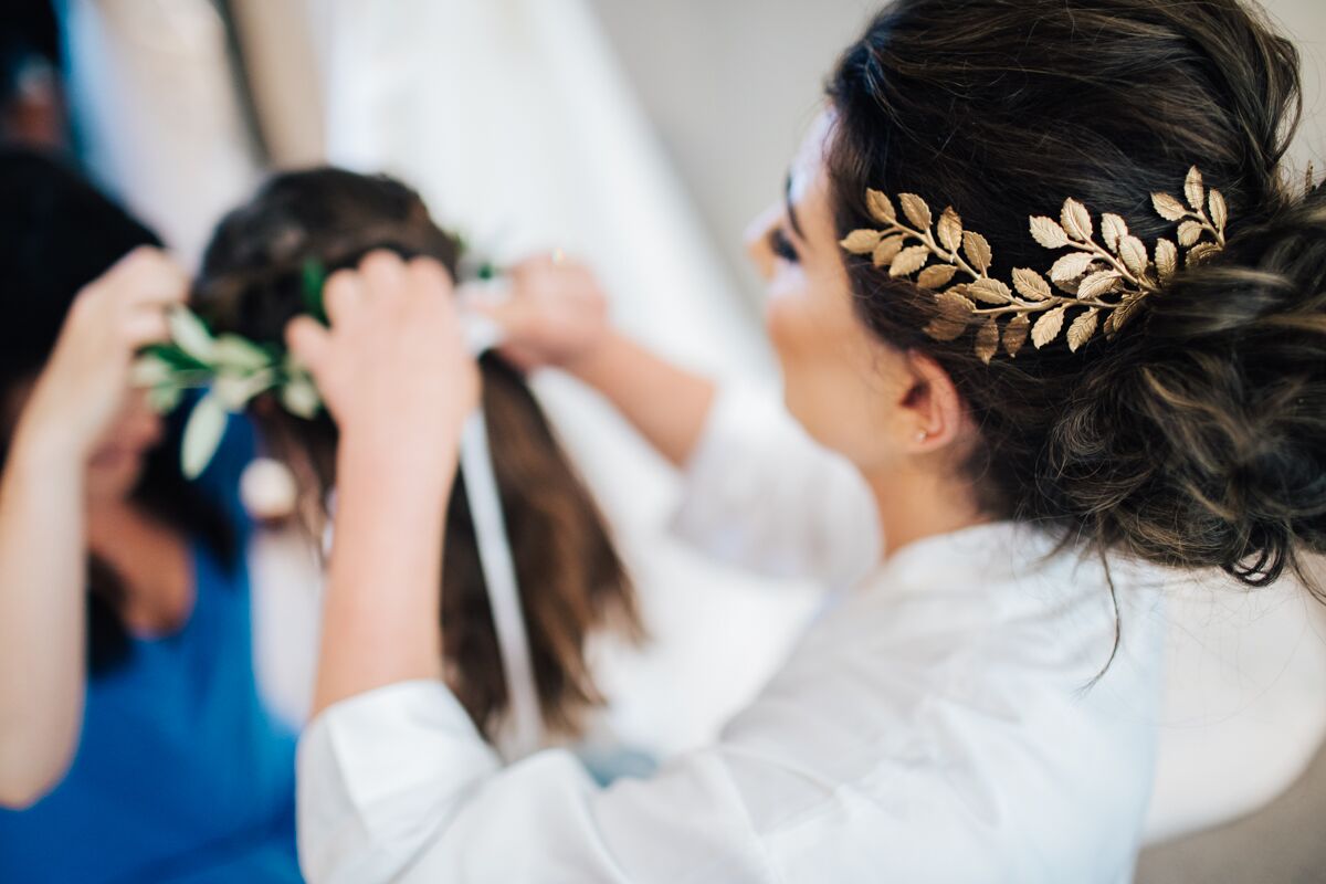 The bride wore a beautiful head piece by Stephanie Brown Australia