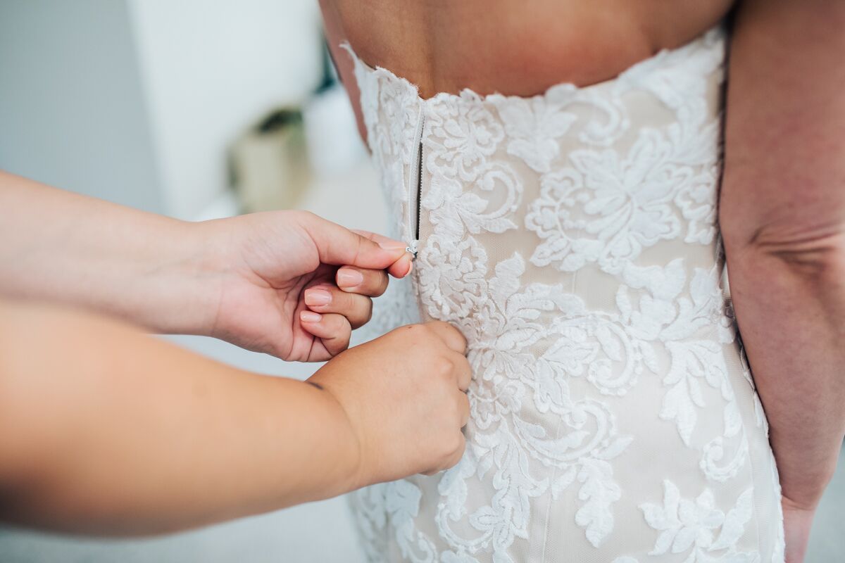 Vicky's stunning lace gown was by Enzoan