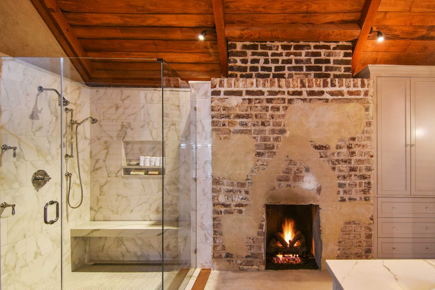 restored-brick-fireplace-bathroom.jpg