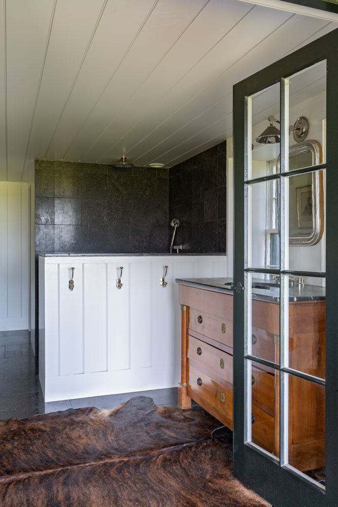 renovated-bath-house-custom-antique-vanity.jpg