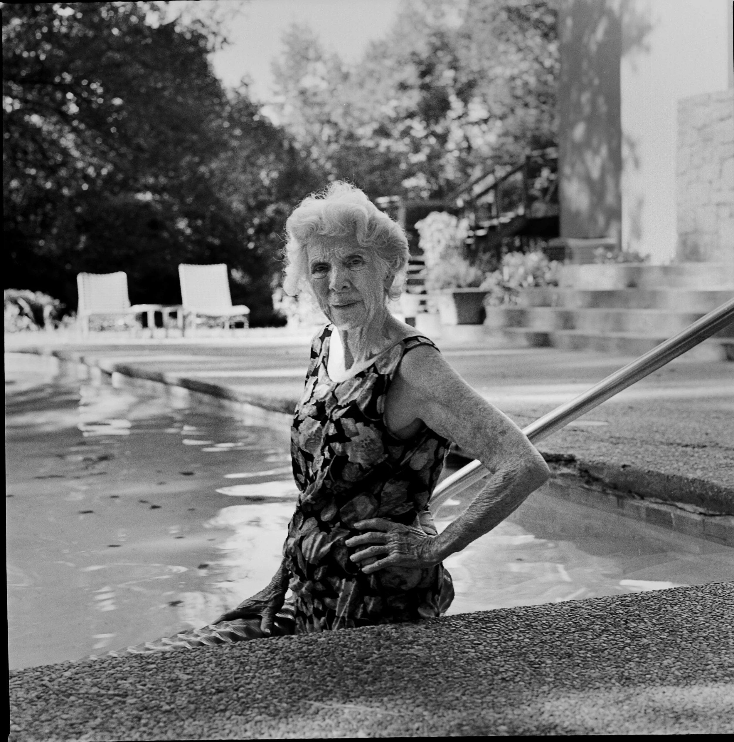 Mom in Pool on Steps.jpg