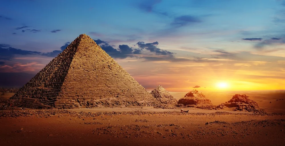 bigstock-egyptian-pyramids-in-sand-dese-265254931.jpg
