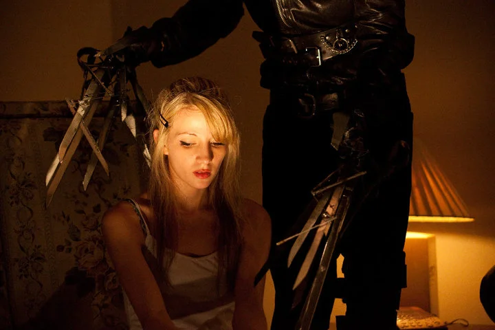 An audience member gets a hair cut to remember from Edward Scissorhands 