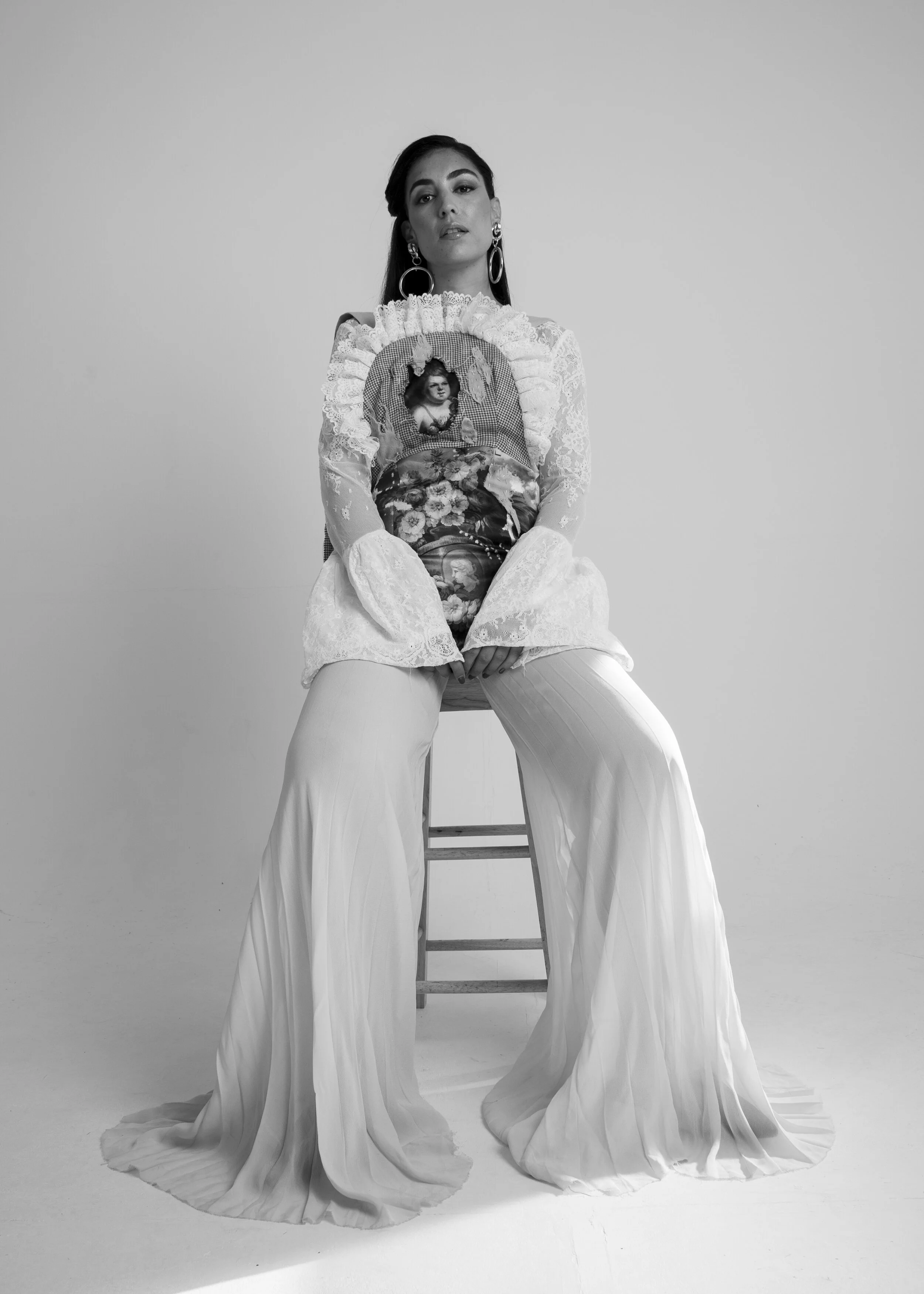 Jumpsuit by ANA LJUBINKOVIC and earrings by épifenē