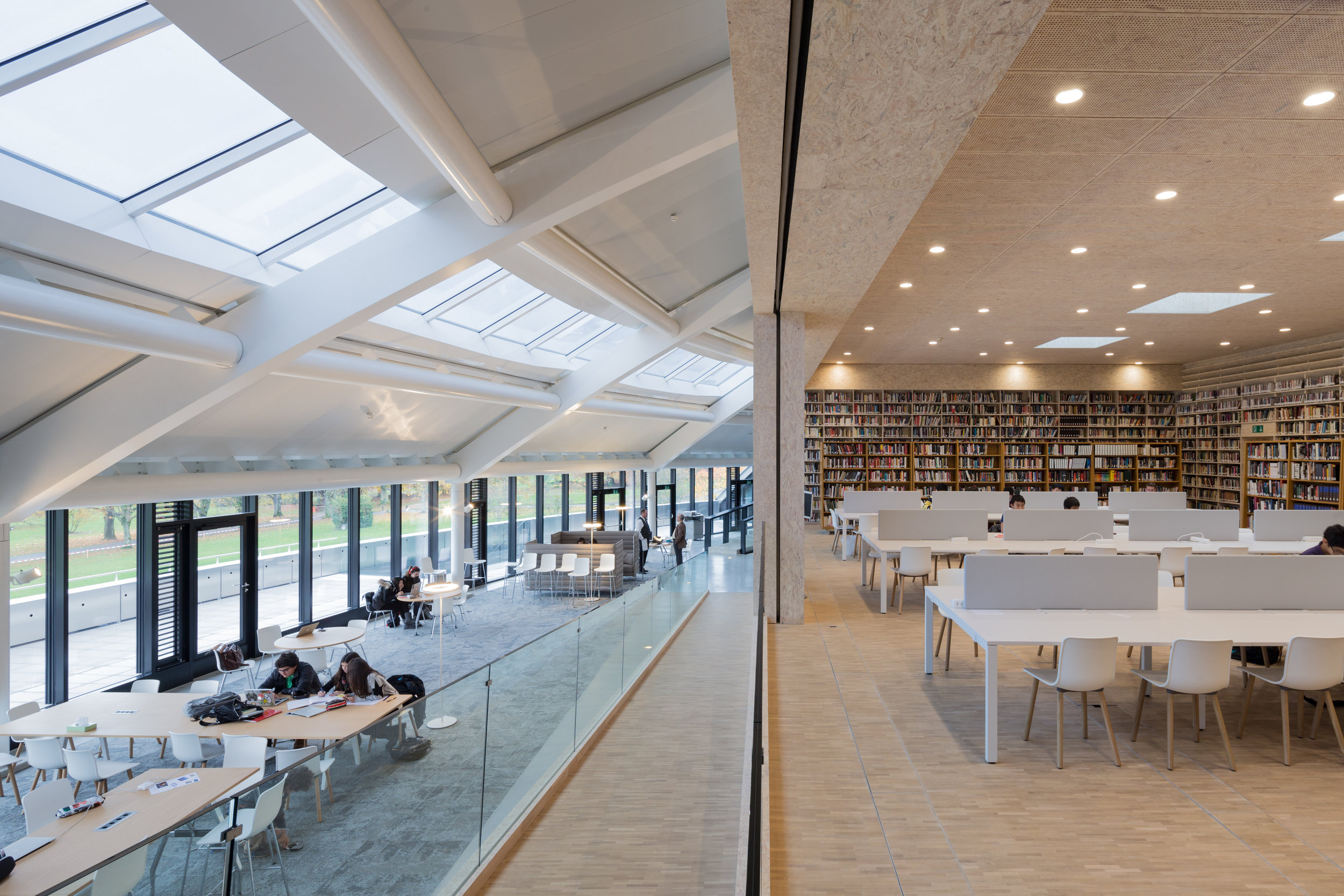Wood is used to clad the library space which opens on to the student learning center. (Photo: Iwan Baan)