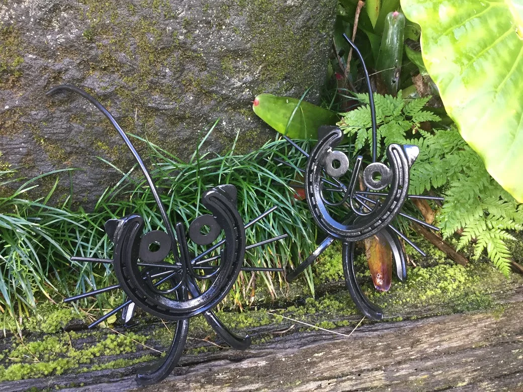  MADDIE  $99.00  Maddison - Maddie - was our beloved cat and gardening 'mate' for 21 years and we named our business after her .  Made from horseshoes, is different and very cute. Always commented on.  - Not too good at catching mice though! 