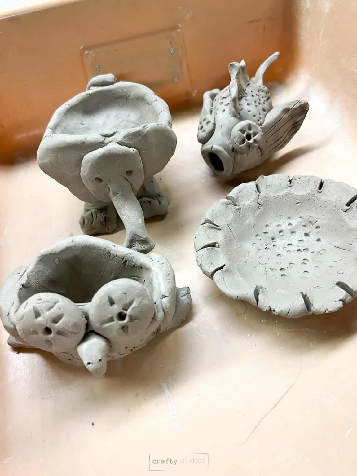pinch pot animals.jpeg