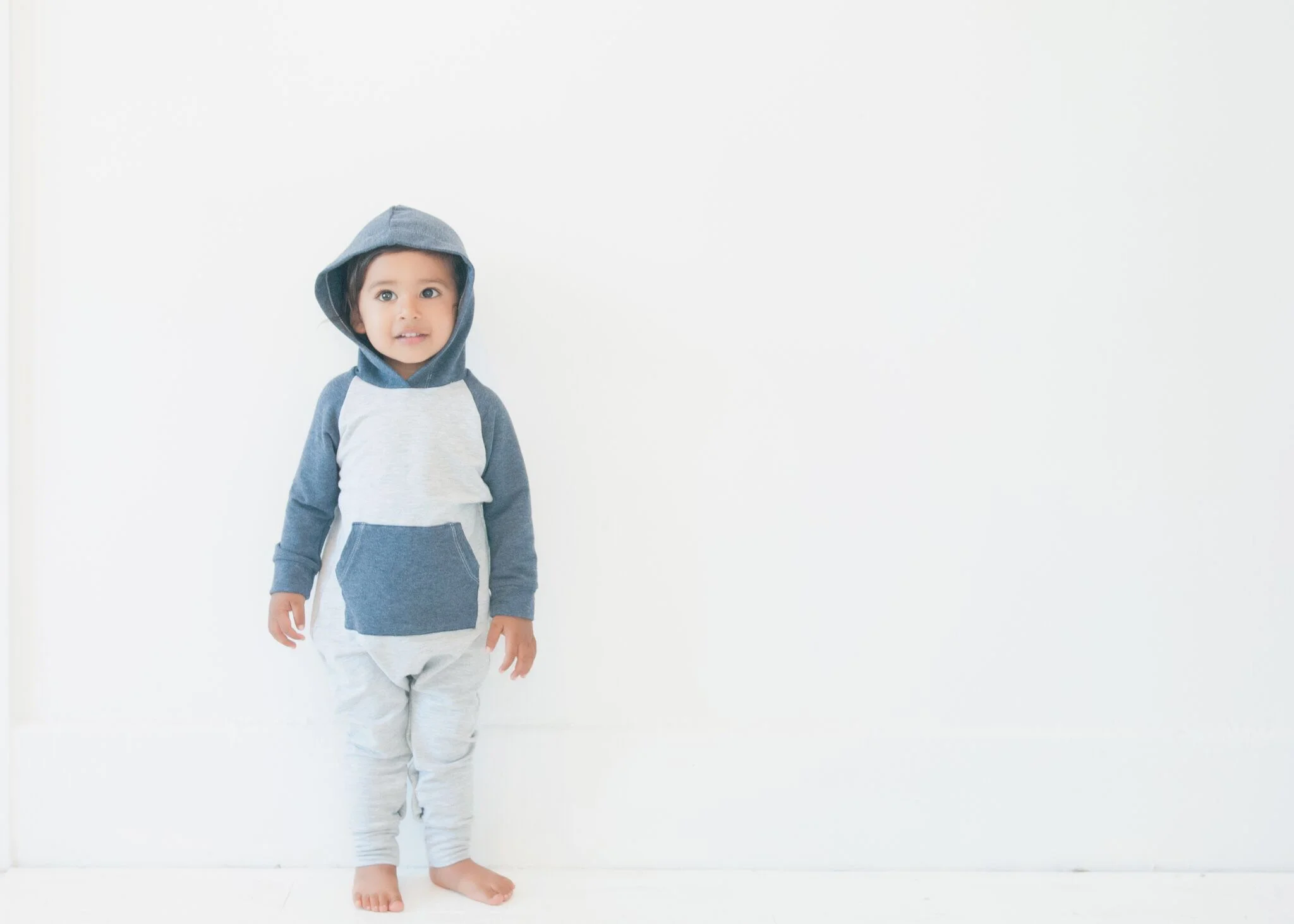 Qaayam in Petunia and Buster romper that will drop online in early November
