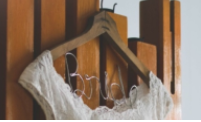 "BRIDE" HANGER QUANTITY: 1 RENT: $3