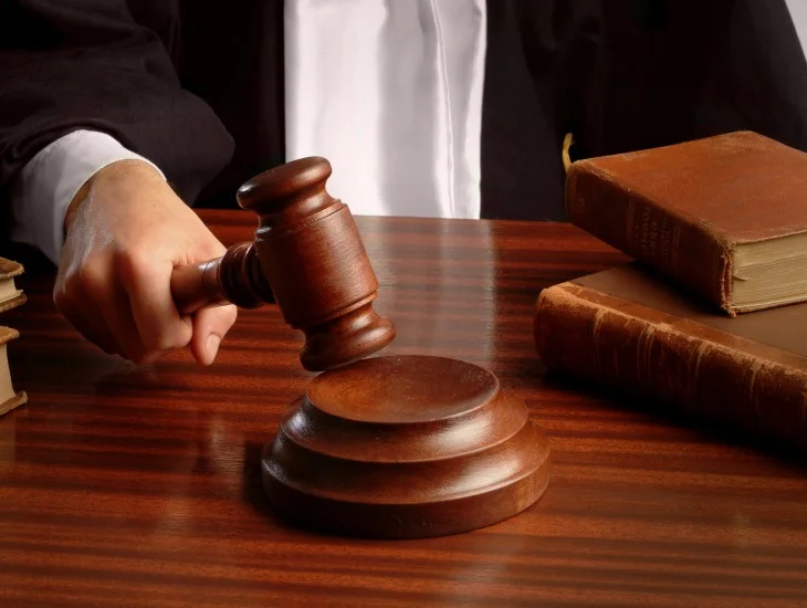 Judge dismisses 2 counts of using a document to obtain a pecuniary advantage