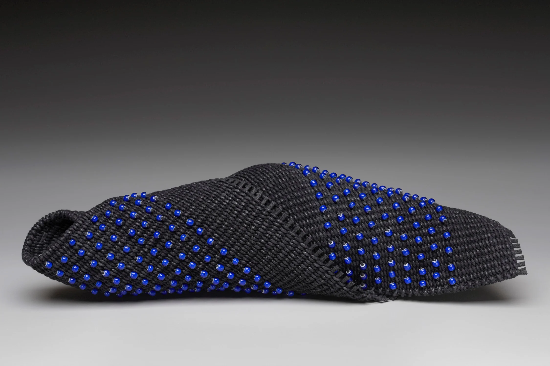 BLEU - Waxed cotton with cobalt blue white heart beads woven into the structure.