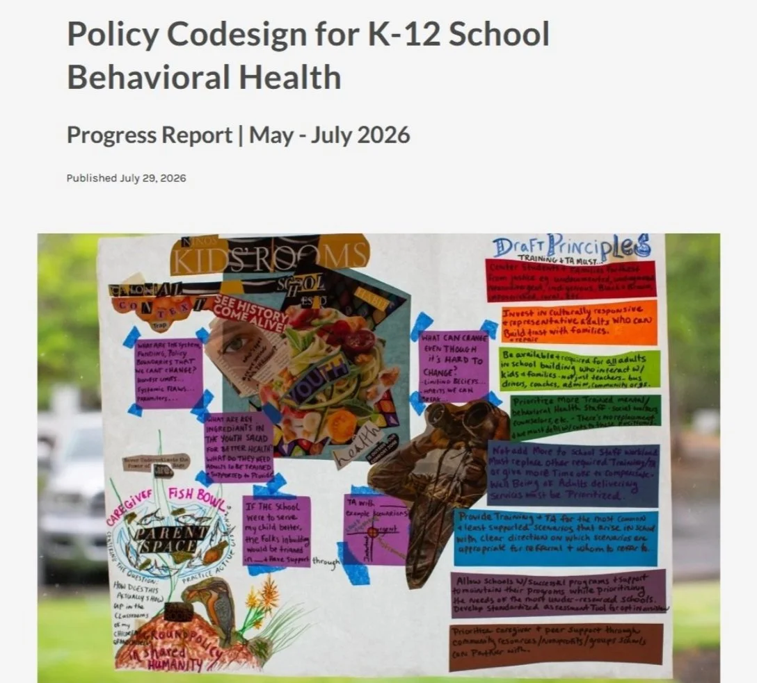 The text reads, "Policy Codesign for K-12 School Behavioral Health Progress Report | May - July 2026". An image of a poster is seen under the text with various cut out paper of various sizes and colors, taped up with blue painter's tape.