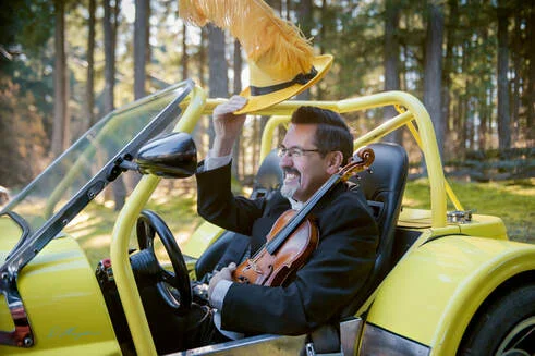 calvin-in-yellow-car-2.jpg