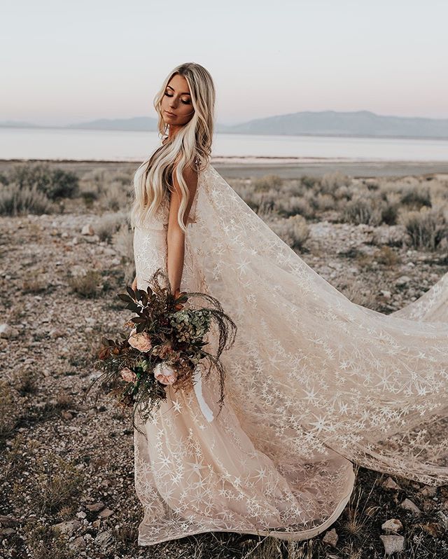 The Calypso Gown gives the perfect dreamy bohemian vibe! We think capes are appropriate for any occasion!⠀⠀⠀⠀⠀⠀⠀⠀⠀
Model: @gottashnichole⠀⠀⠀⠀⠀⠀⠀⠀⠀
Flowers: @connernesbit⠀⠀⠀⠀⠀⠀⠀⠀⠀
Dress: @nataliewynndesign⠀⠀⠀⠀⠀⠀⠀⠀⠀
MUA: @trevorbutlermua⠀⠀⠀⠀⠀⠀⠀⠀⠀
Photo