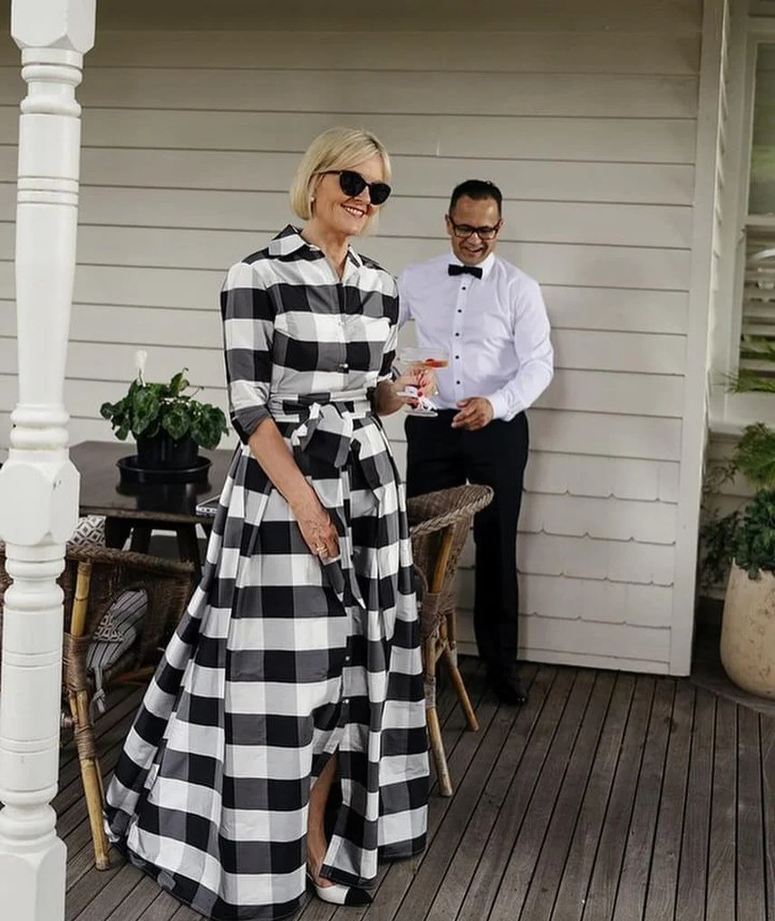 black &amp; white &mdash; bold, never boring. the chicest mother of the bride dressed the part! LucianaEmilia
