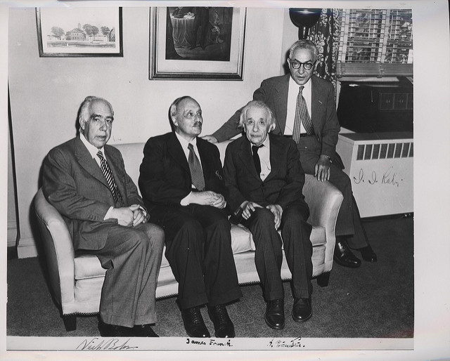 Niels Bohr sits on the left.