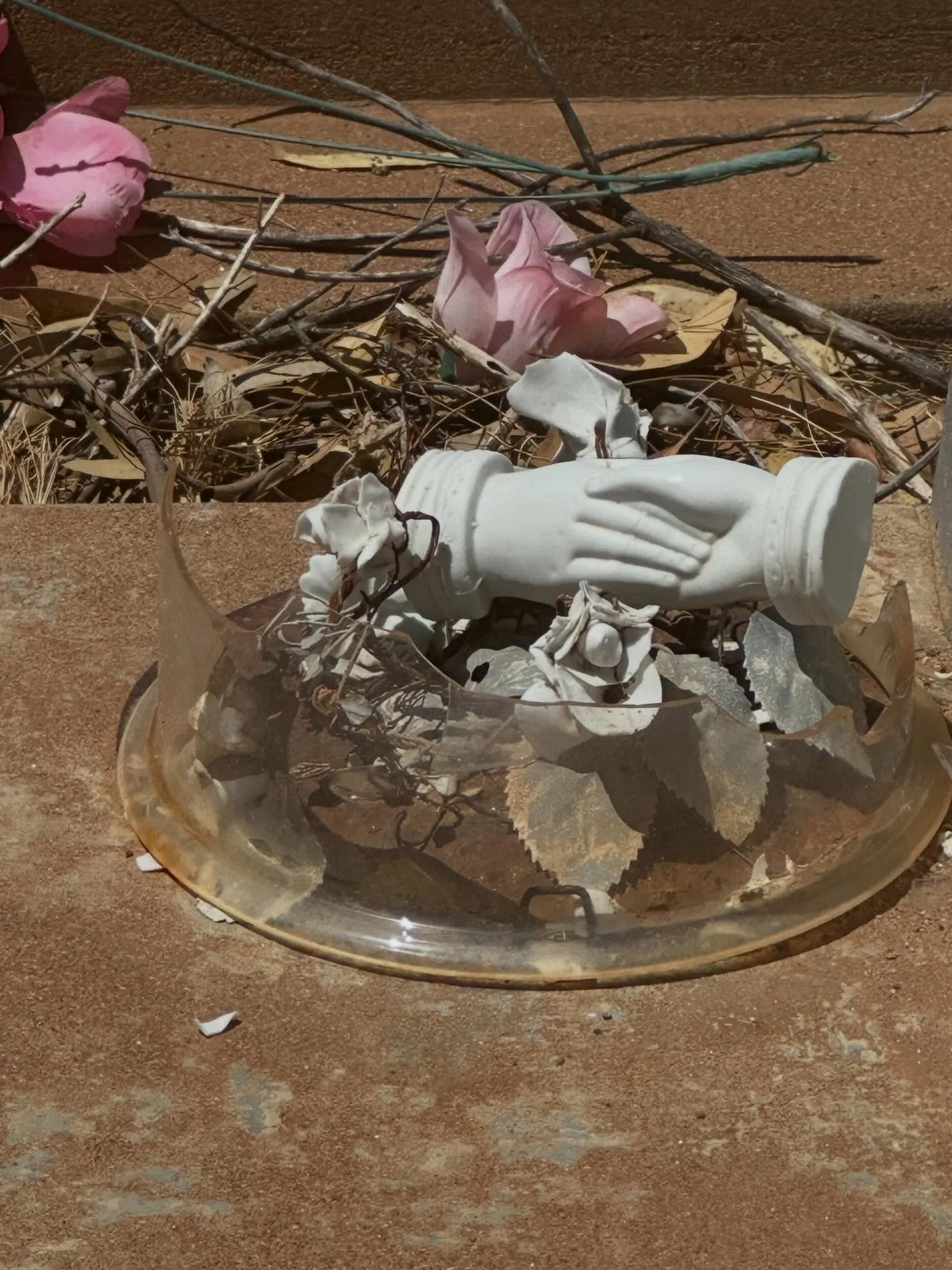 Clasped hands can symbolize an eternal bond, partnership, a final farewell, or the promise of being reunited with a spouse or loved one in heaven. If one hand is positioned slightly higher or is leading, it often represents the person who passed away