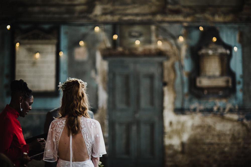 The registrar delivering the words to be repeated by groom and then bride during the wedding ceremony.