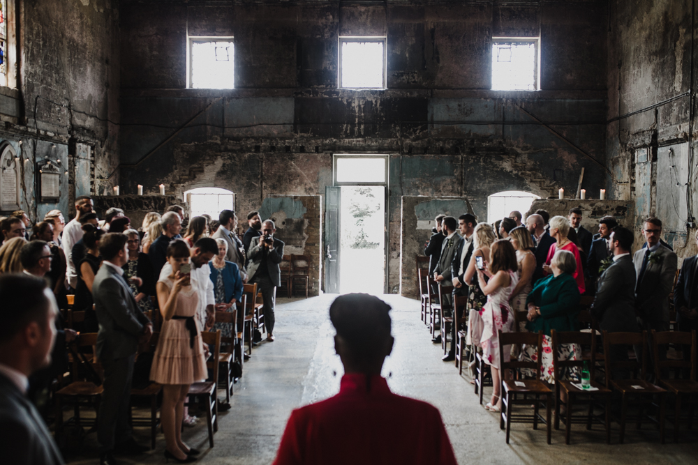 Guests await the brides arrival at her Asylum Chapel Wedding
