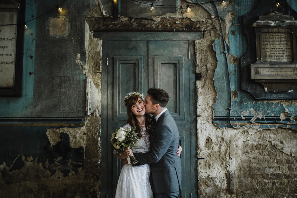 A natural, candid portrait of bride and groom together after the wedding ceremony.