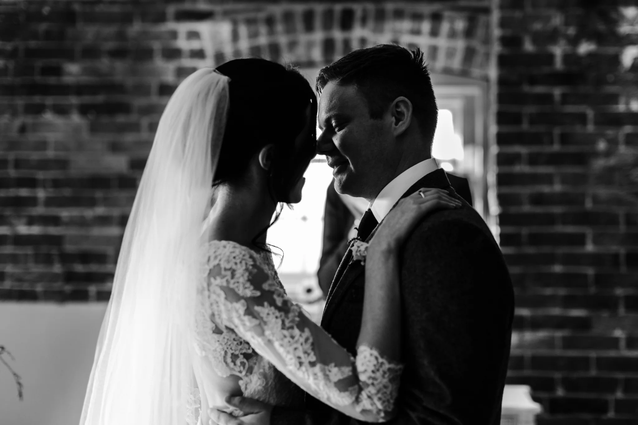 Bride and groom old to kiss