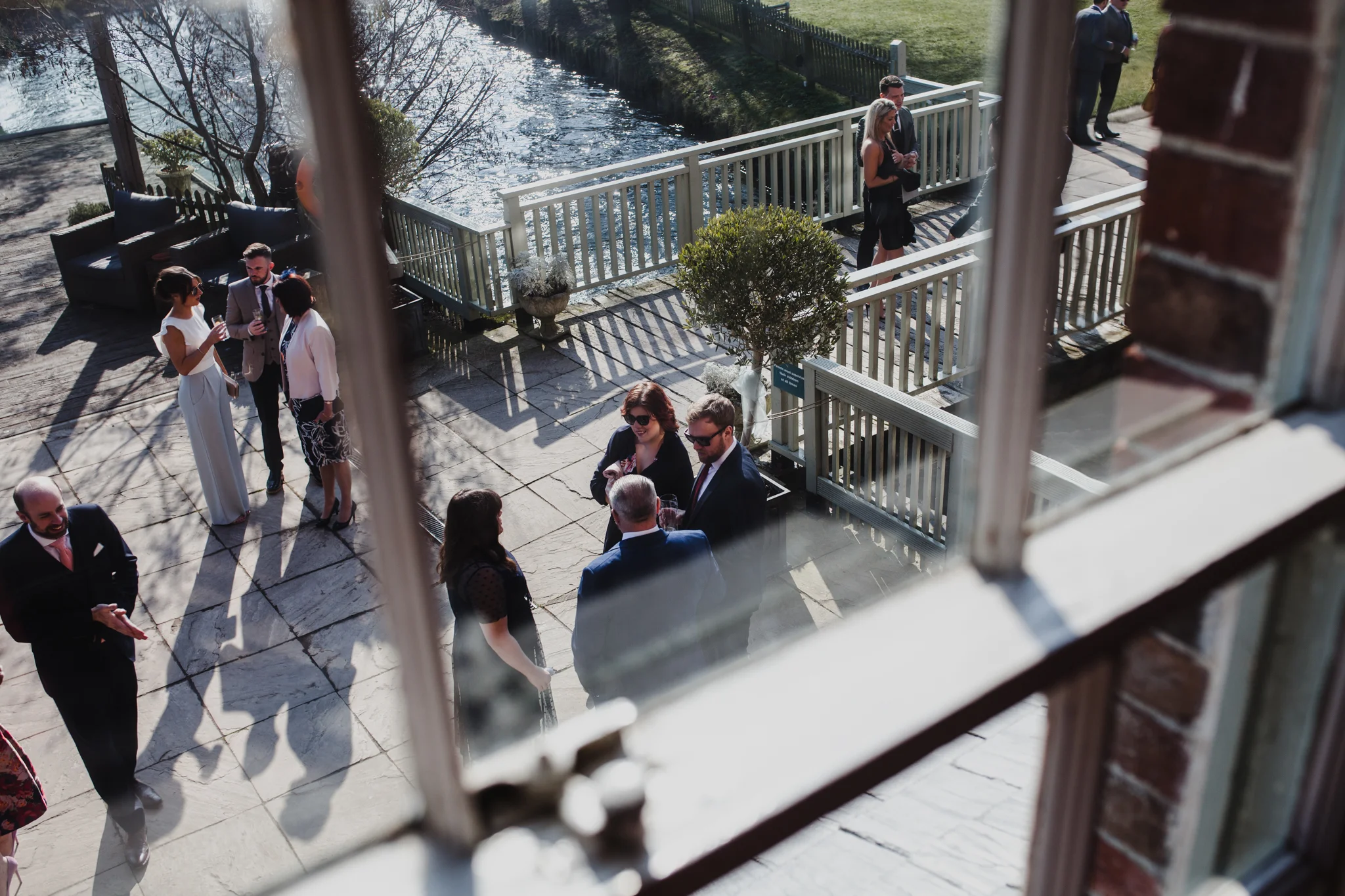 View out the window of wedding guests