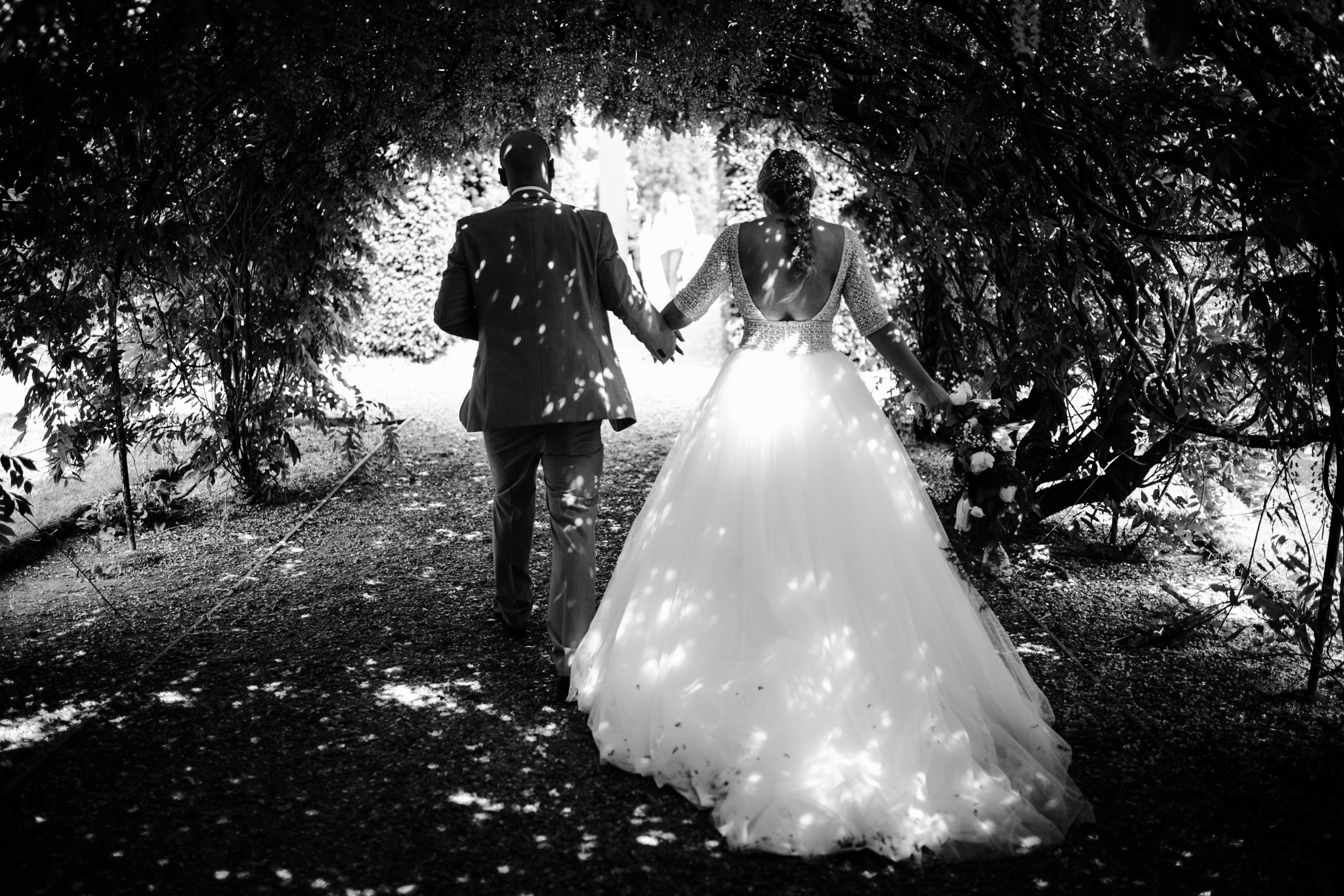 dappled light on bride and groom