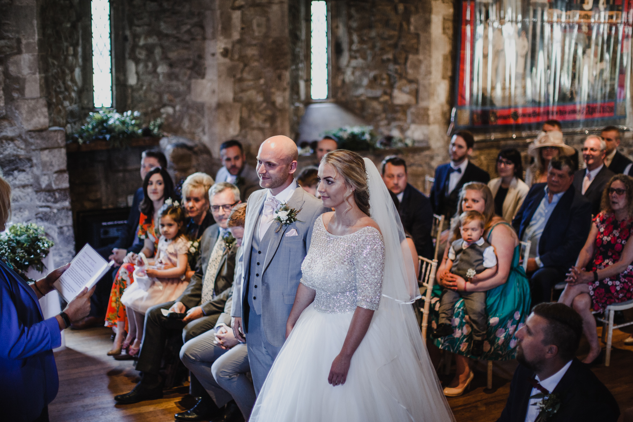 Bride and groom getting married in tudor style wedding venue