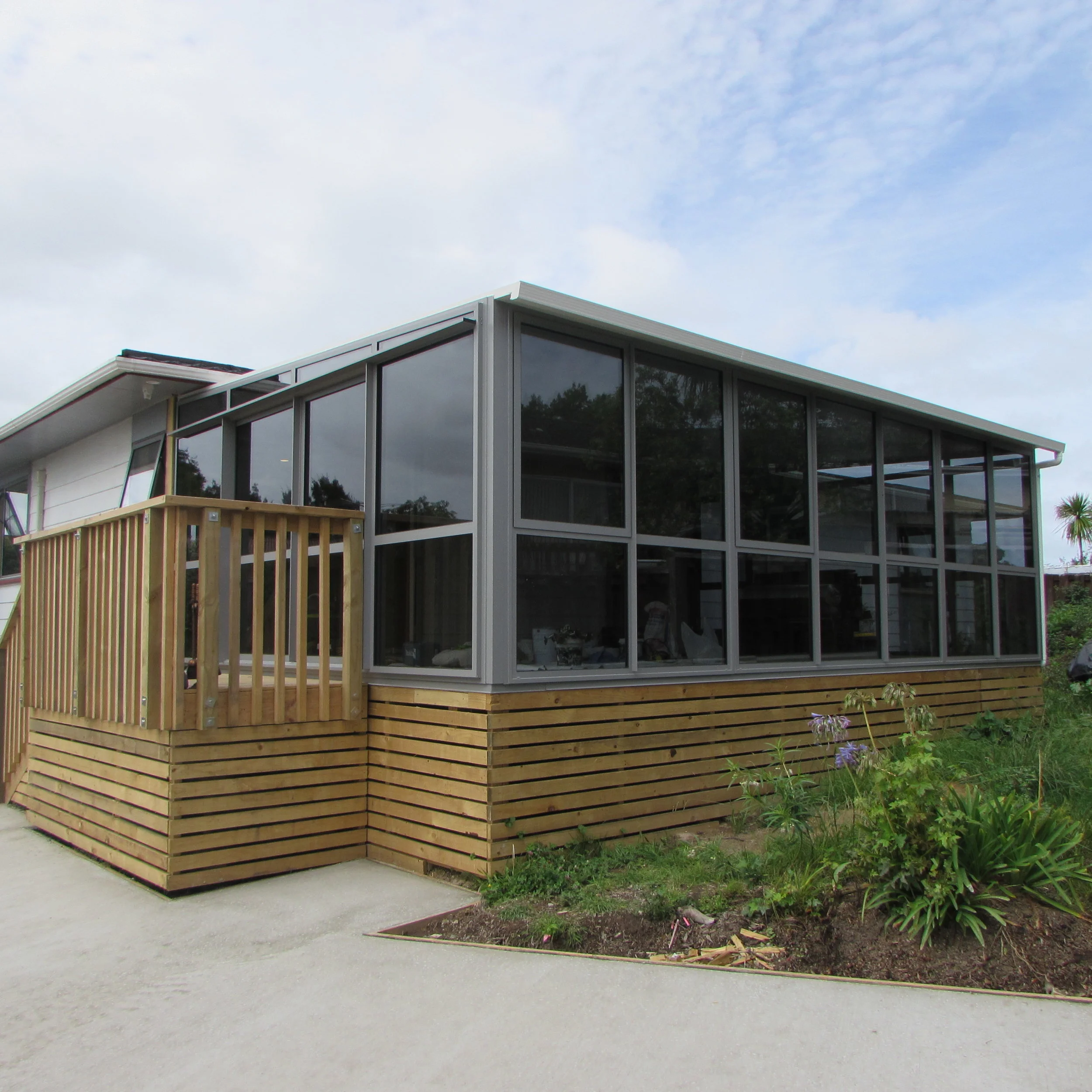 Existing building extension to small deck