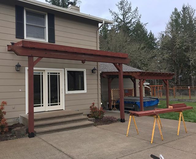 We built a #Pergola over a hot tub for this client last summer. Then they called and wanted another one over their back door. We appreciate our repeat clients! #workhorsebuilt
