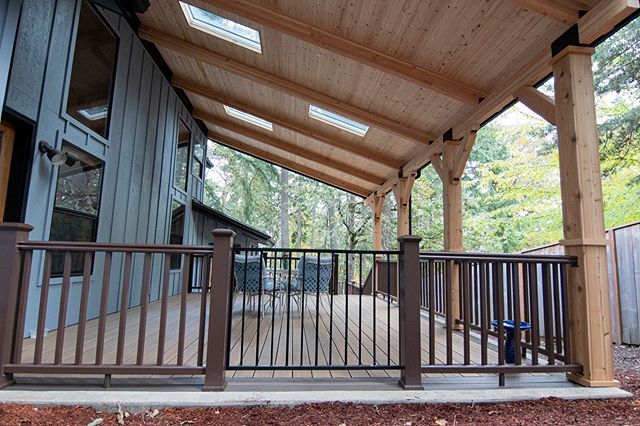 This project was a very big transformation!  We extended the roofline and added skylights for rain protection.  Then we added two levels of decks with TimerTech Tigerwood and Mocha accents.  We always enjoy getting to know our client's pets and this 