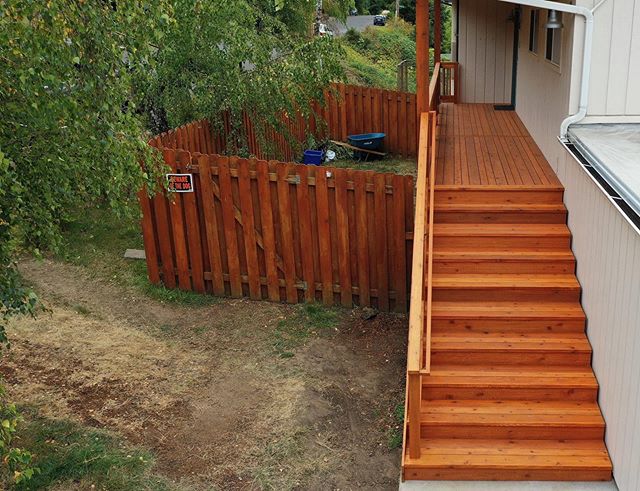 A cedar deck we built this summer. We used multi-width boards on this one. #cedardeck #decks #workhorsebuilt