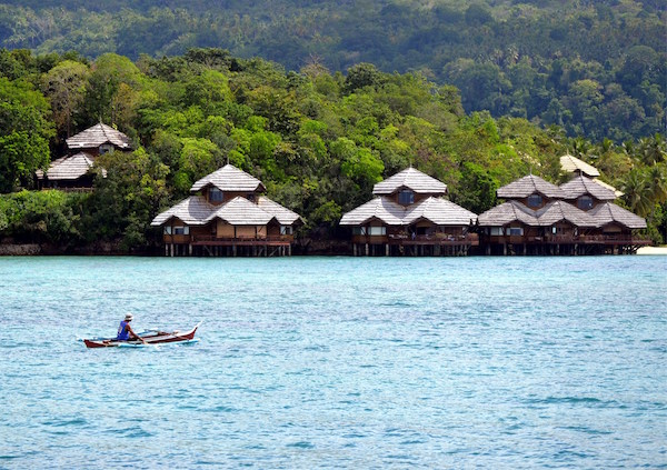These waterfront bunAgalows on Malipano Island of the Philippines were designed by world-renowned Architect Francisco “Bobby” Mañosa, inspired by the stilt houses of the Sulu Sea using native materials such as bamboo, coconut and yakal.