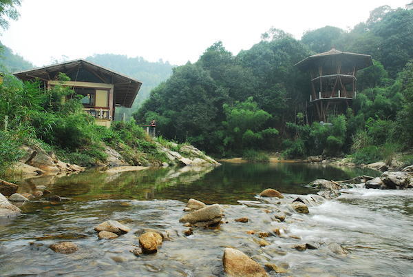 Crosswaters Ecolodge in China exemplifies the use of sustainable building materials such as locally harvested bamboo. Here, an observation tower and a fine dining restaurant are located where two rivers meet.