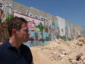 At Kalandia checkpoint, between Israel and the West Bank.